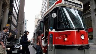 Toronto says goodbye to its classic red streetcars [upl. by Lleret]