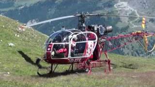 Air Zermatt helicopter quotLamaquot taking off in the mountains  takeoff [upl. by Nert]